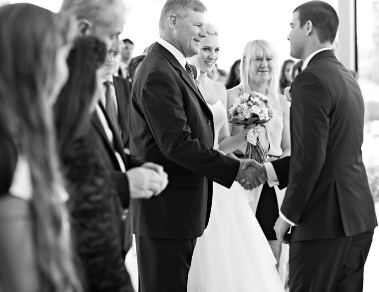 bride with family in the aisle